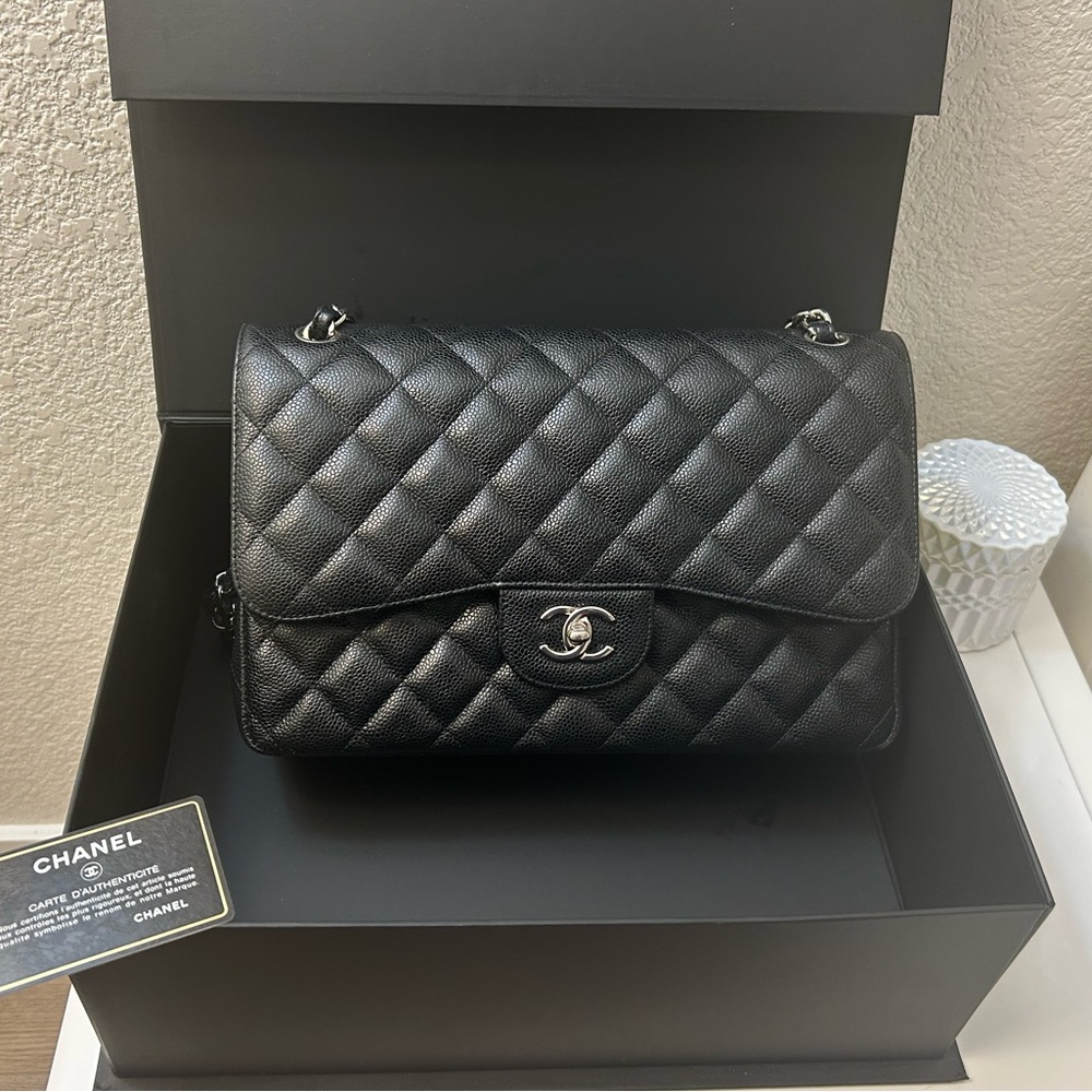 SOLD — Chanel Jumbo Classic Flap In Black Caviar Leather w/ SHW